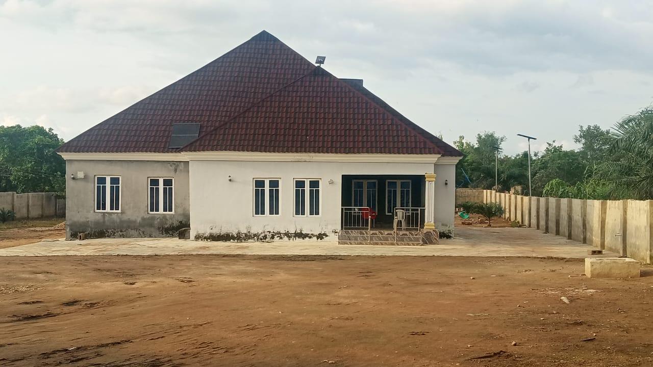 Contemporary residential building with security gate in Takete-Ide